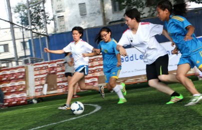 girls playing football